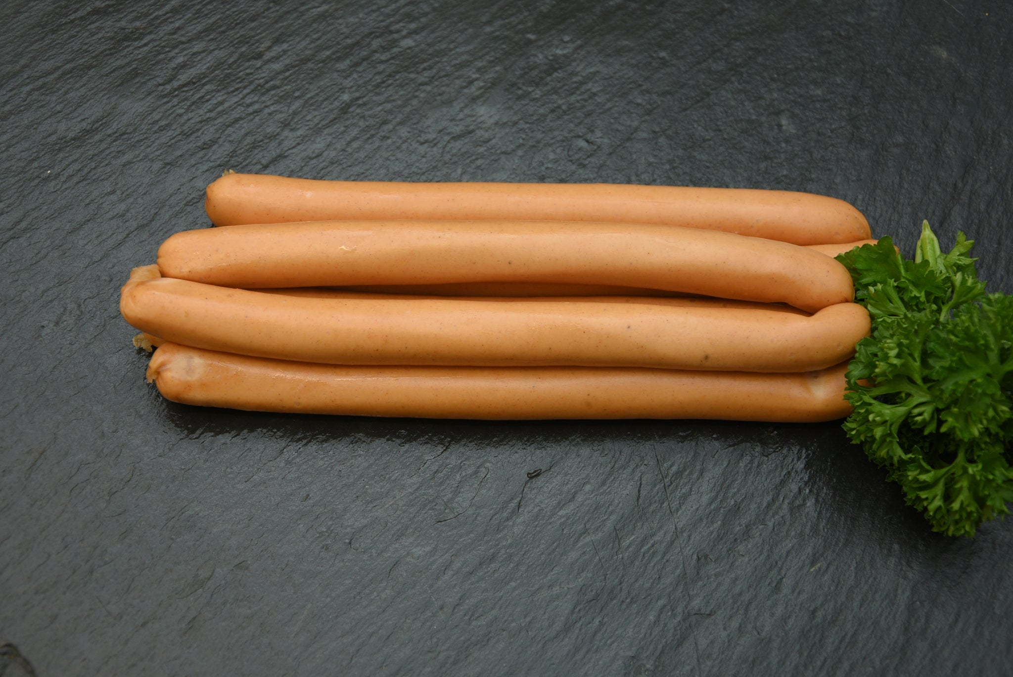 Geflügelwiener (Paar, ca. 140g), Preis pro kg 20,90€ - Anzahlung