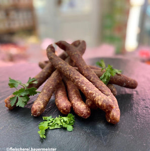 Schinkenknacker (pro Stück ca. 80g), Preis pro Kilo 29,90€ - Anzahlung